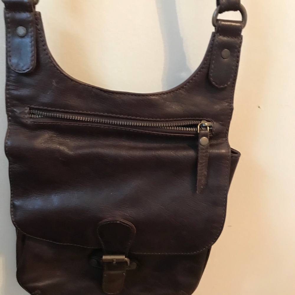 Fat face leather cross body bag